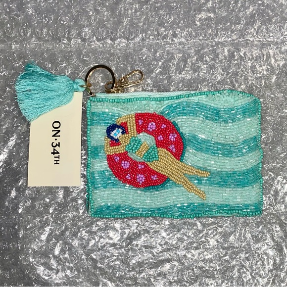 ON 34th Handbags - Glass Beaded Coin Purse With Key Chain & Tassel, Color: Pool Blue